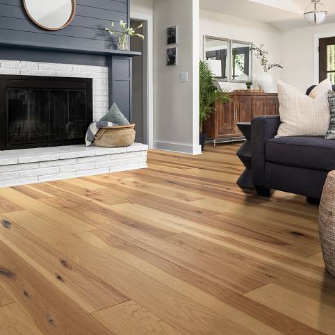 Clean living room hardwood floor | Howmar Carpet Inc