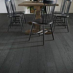 Beautiful chairs on dining room hardwood floor | Howmar Carpet Inc