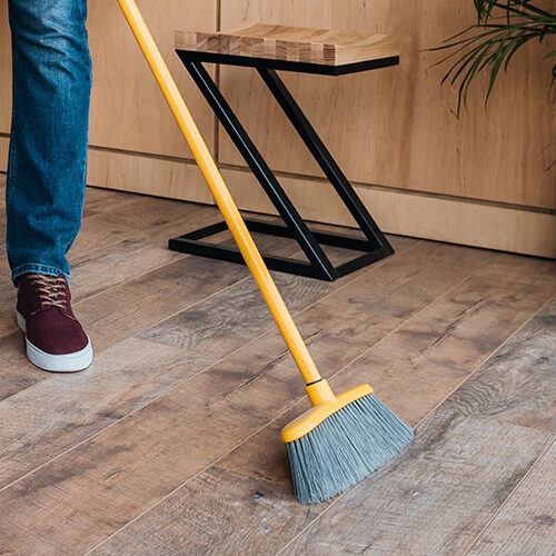 Man cleaning floor | Howmar Carpet Inc