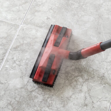 Floor cleaning with vacuum cleaner | Howmar Carpet Inc